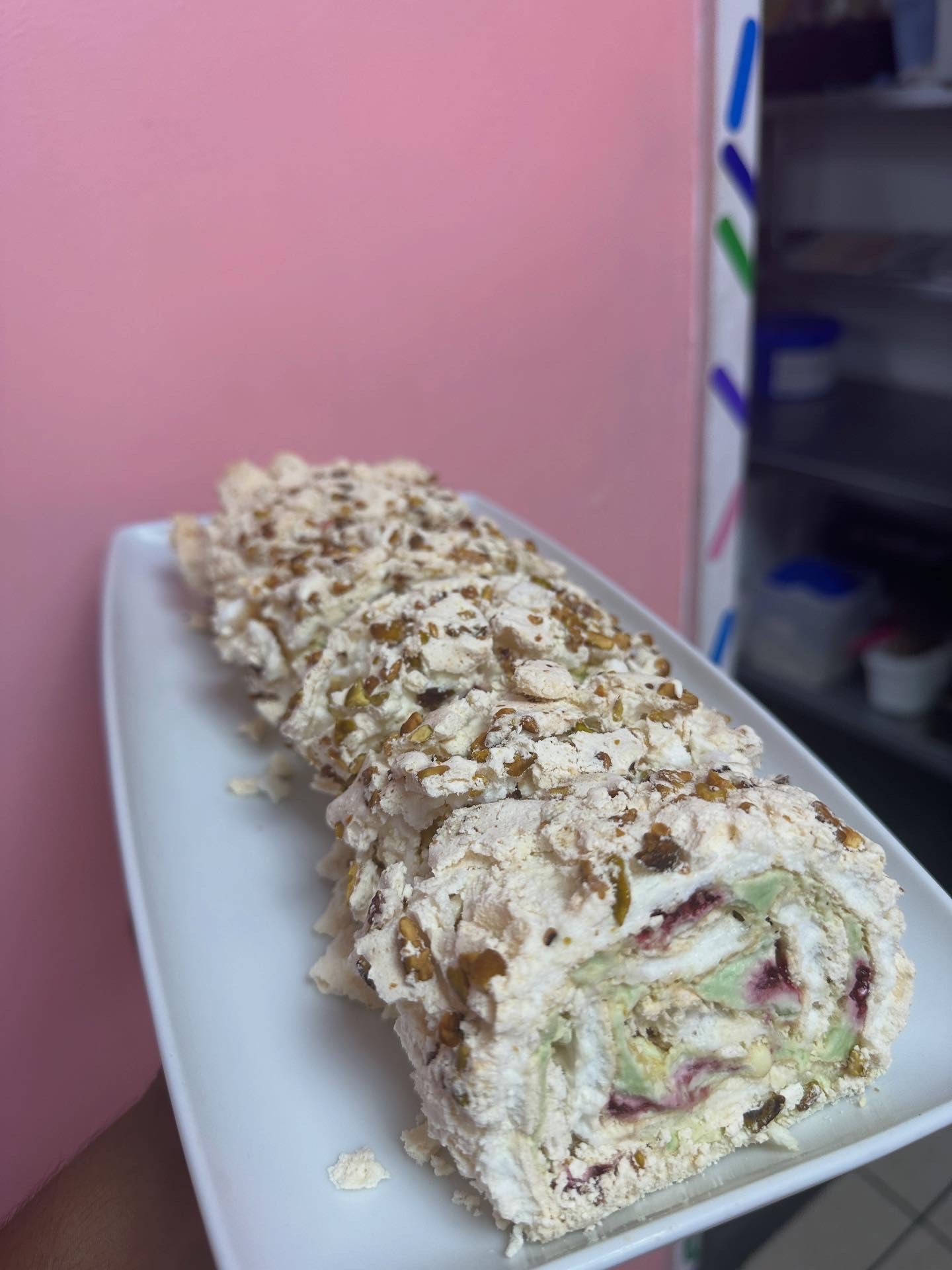 Pistachio white chocolate & raspberry Roulade
